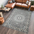 Load image into Gallery viewer, Hereke Sunburst Medallion Rug — Grey — in room