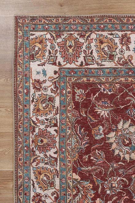 Shiraz Persian Red Area Rug on side in a room