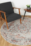 Load image into Gallery viewer, Sauville Blush Multi Round Rug on floor
