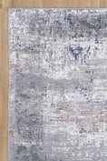 Load image into Gallery viewer, Abstract Border Echo Blue Grey Rug, On Side
